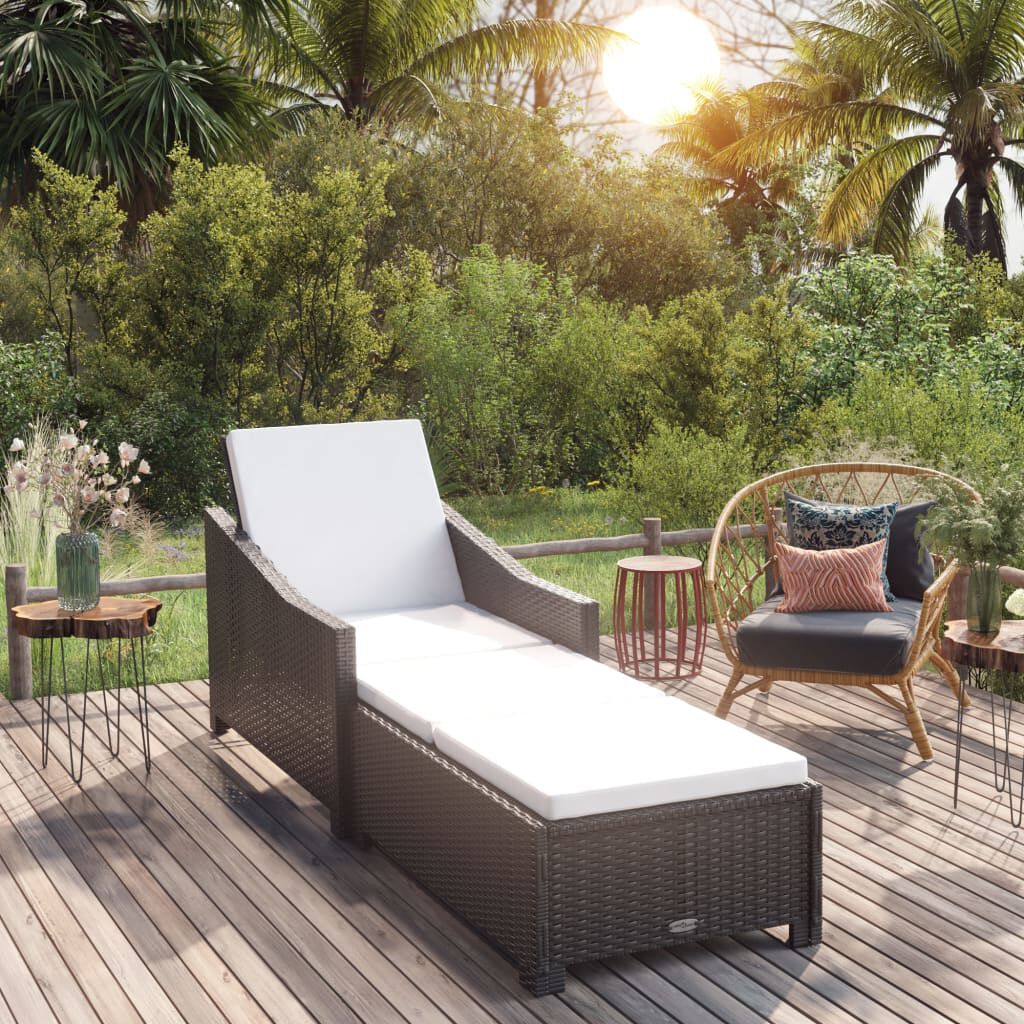 beige rattan sun lounger